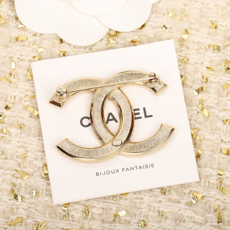 Ch**el brooches